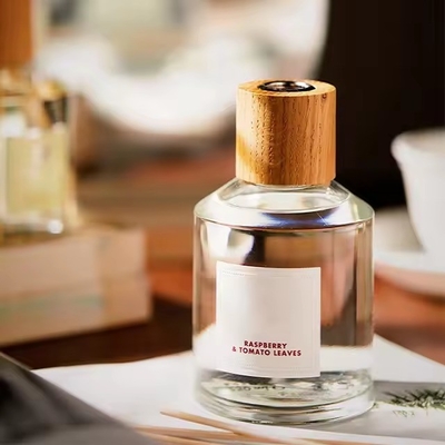 Op maat gemaakte ronde spiraalhouten dekking glazen fles aromatisch riet diffuser duurzame verpakking